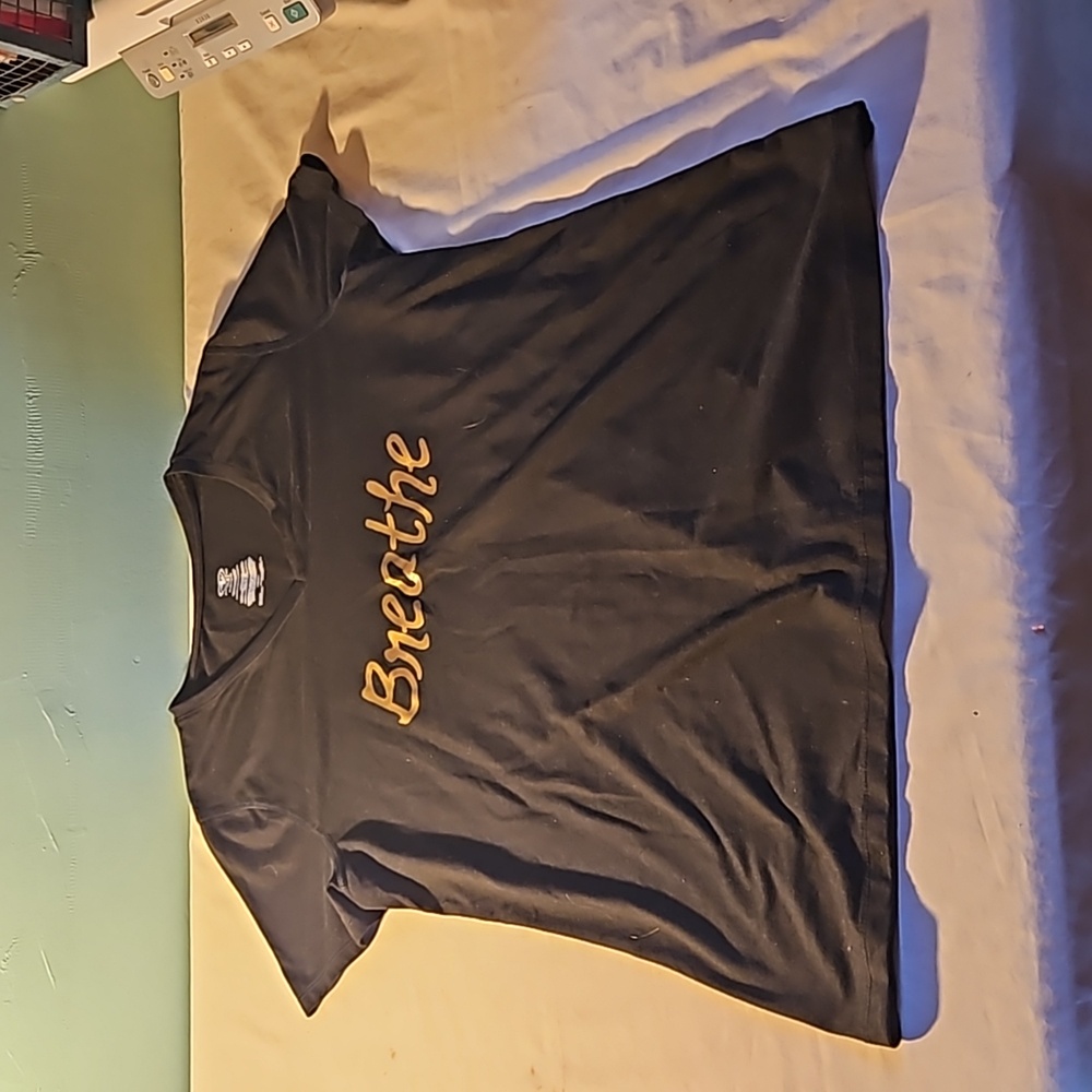 Athletic work shirt size XL says breathe